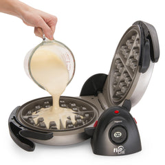 Presto rotating FlipSide while pouring batter for even waffle distribution