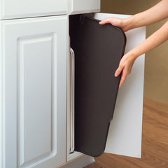 Presto slide-out drip tray catching grease for quick cleanup