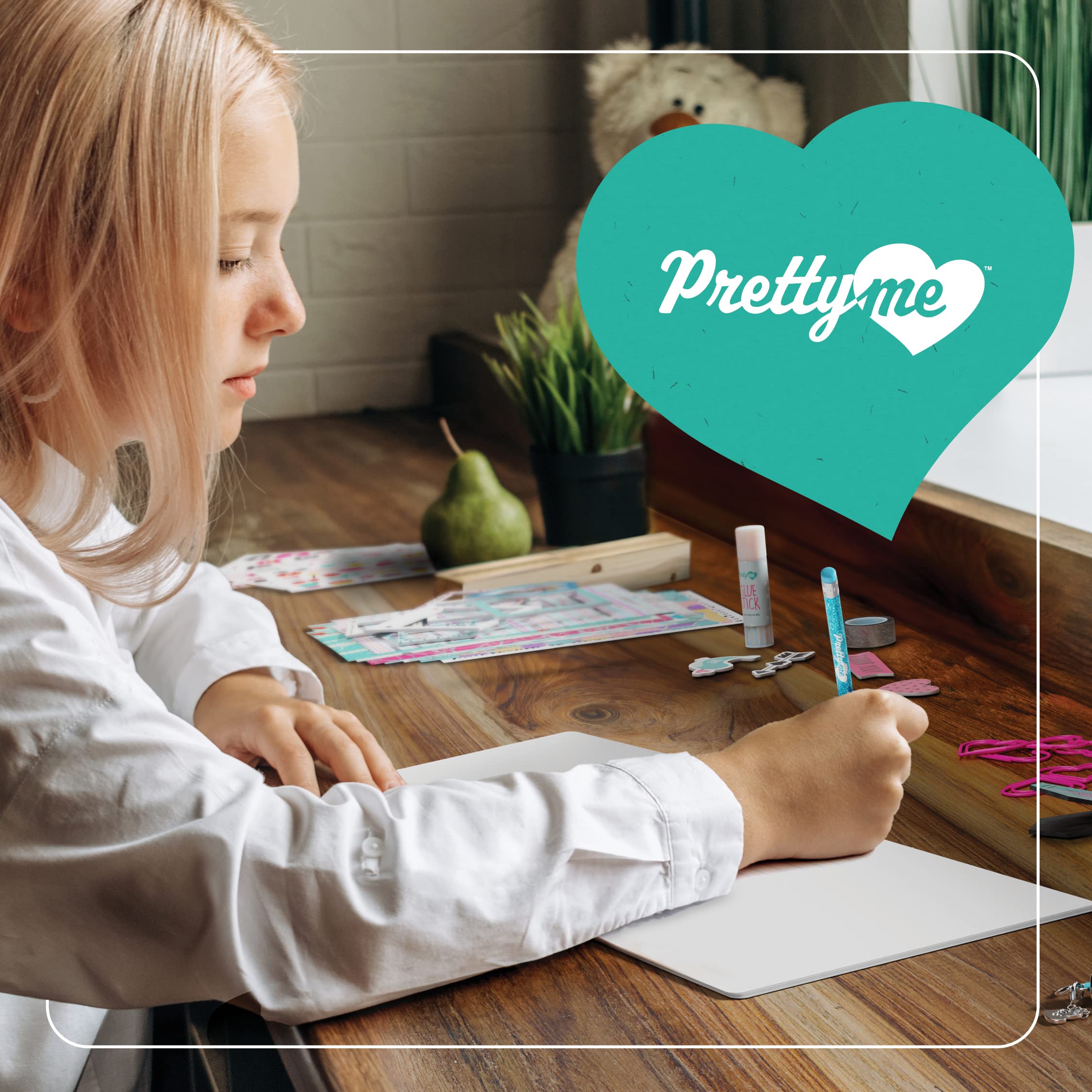 Pretty Me girl using the kit to decorate pages, promoting imaginative play