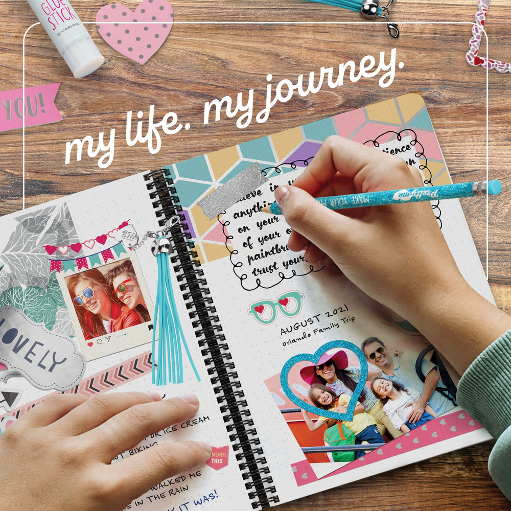 Pretty Me open spiral journal showing 70 blank pages for creativity