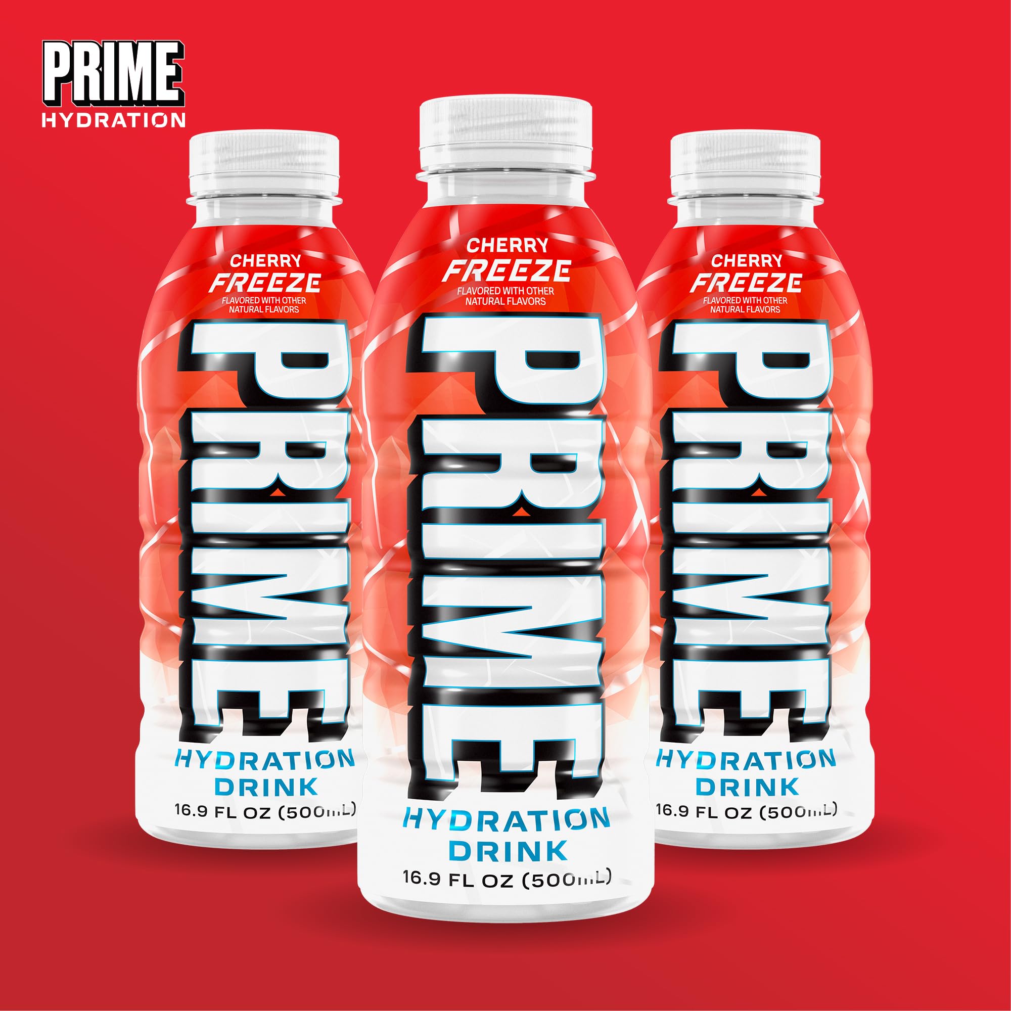 PRIME Hydration Cherry Freeze held outdoors in lifestyle scene showing active refreshment benefit