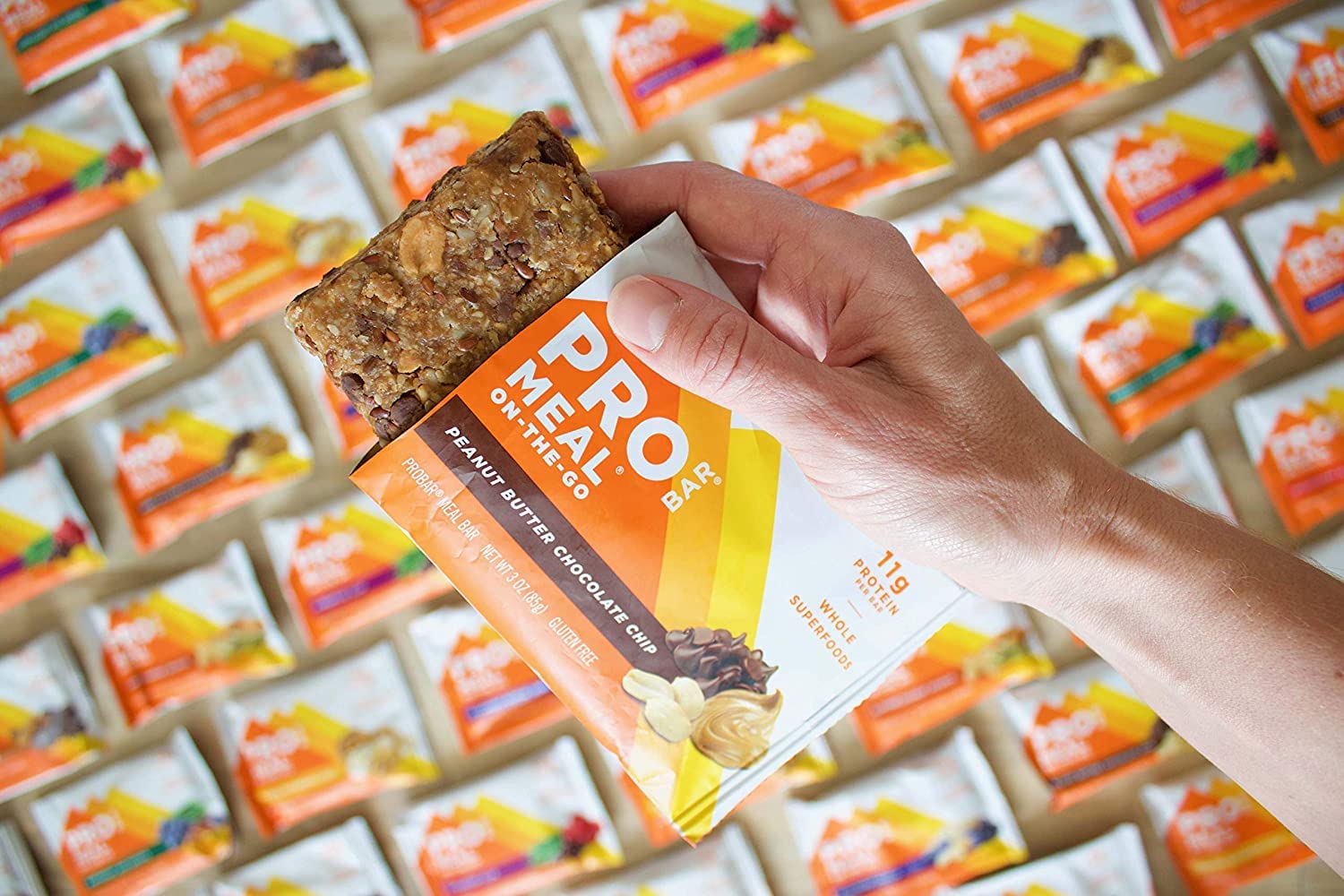 PROBAR bar cross-section showing chewy texture and nut swirls for satisfying bite