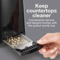 Proctor Silex removable crumb tray pulled out for quick no-mess cleaning