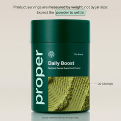 Proper The Greens powder on a spoon close-up highlighting fine texture and mixability