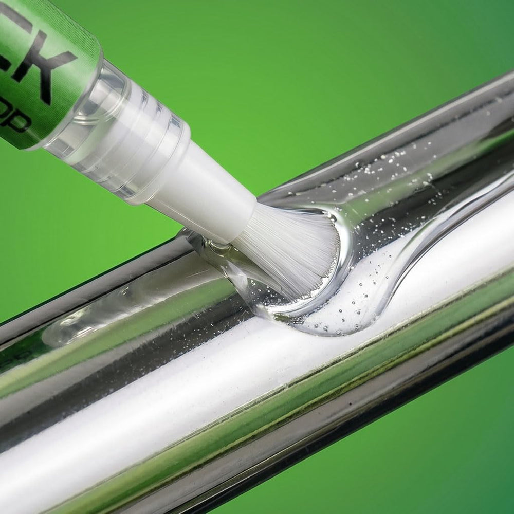 Generic proudle OilStick next to ruler showing compact size for tight spaces benefit