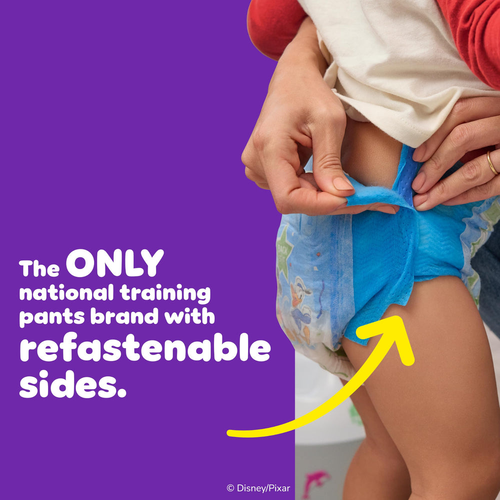Pull-Ups in use with child pulling up pants promoting independence and confidence