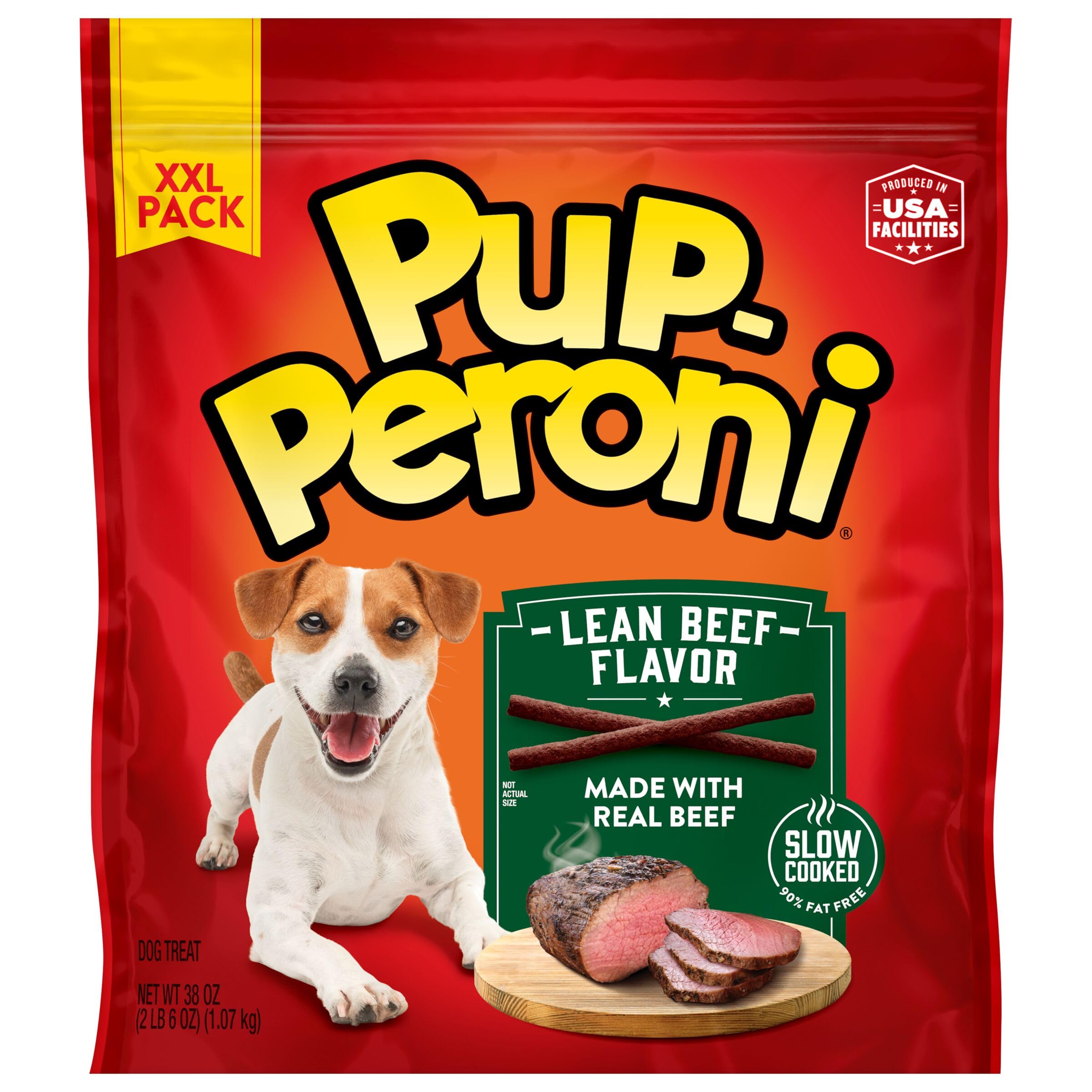 Owner giving Pup-Peroni treat to dog in a happy moment