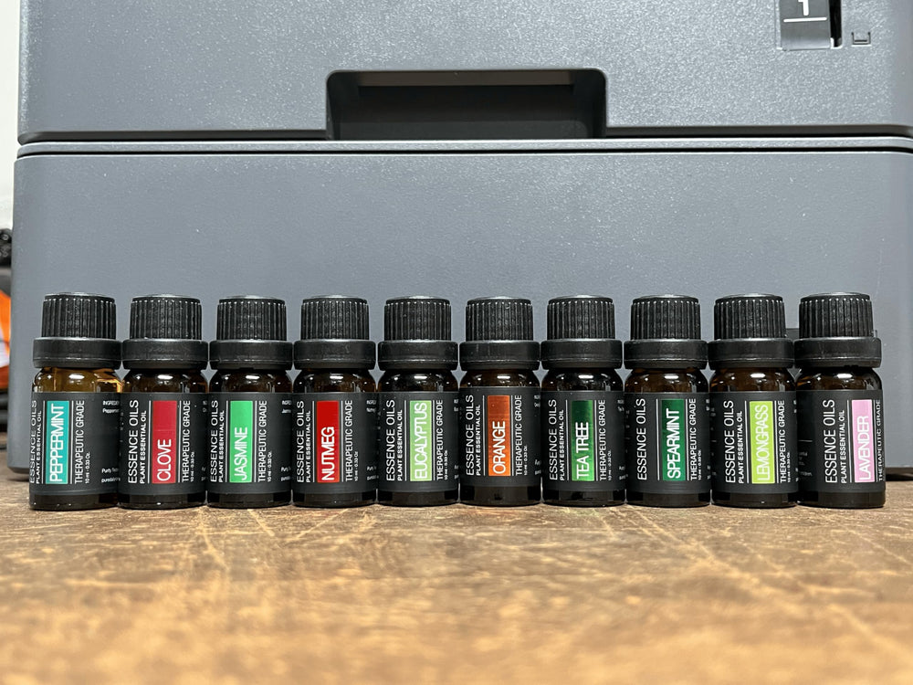 Pure Daily Care diffuser next to smartphone showing compact size and portability