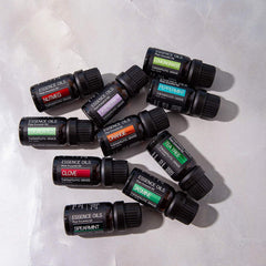 Pure Daily Care ten essential oils lined up showing variety for blending