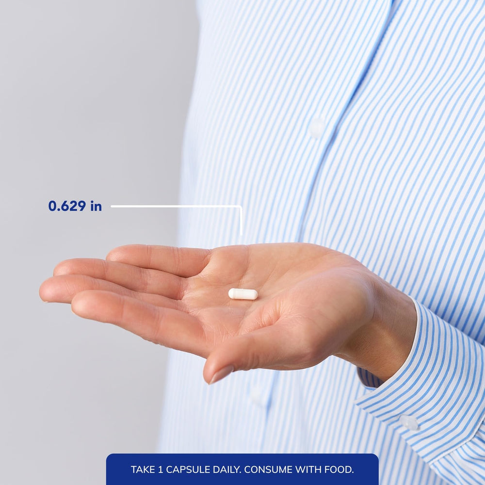 Hand holding Pure Encapsulations capsules illustrating easy daily dosing