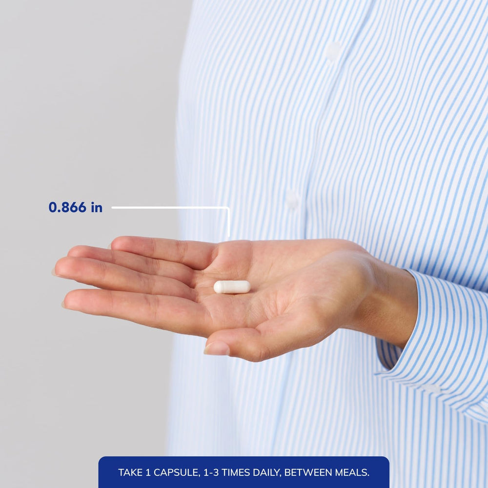 Hand holding one Pure Encapsulations NAC capsule for size and dosing clarity benefit