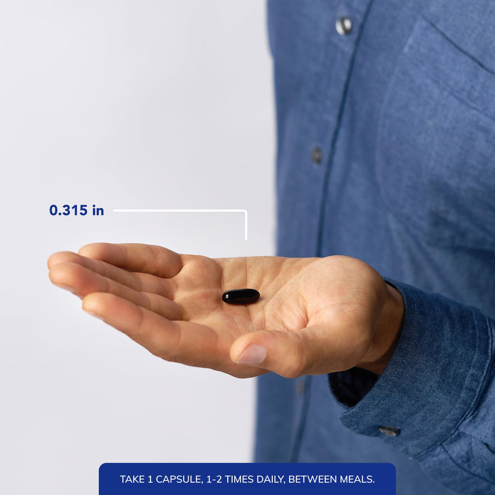 Pure Encapsulations softgel in hand illustrating manageable size for daily use
