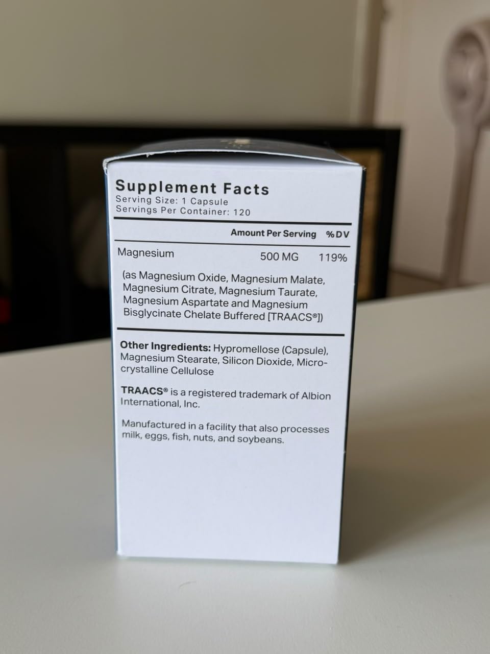 Purely Optimal next to a coin showing capsule scale and convenience
