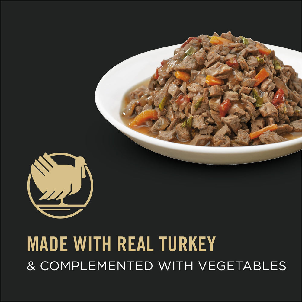Purina Pro Plan open can close-up of gravy and chunks, enticing moisture boost benefit