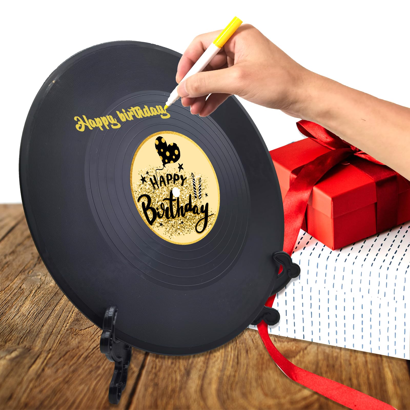 pwvsayjcj vinyl record beside a ruler showing the 11.6 inch scale for size clarity