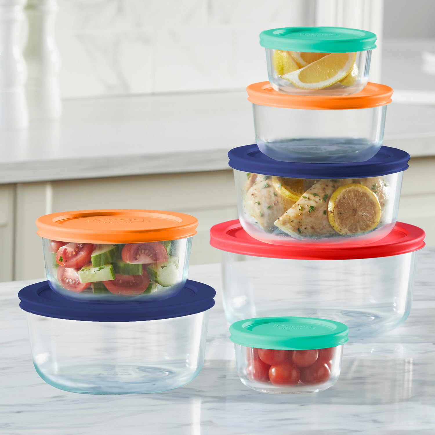 Pyrex color-coded lids detail for quick fridge organization and identification