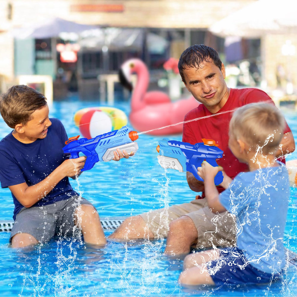 Quanquer water gun held in adult hand to show scale and lightweight portability