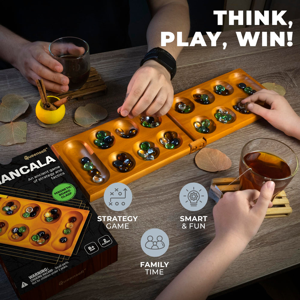Queensell two players playing mancala demonstrating family engagement benefit