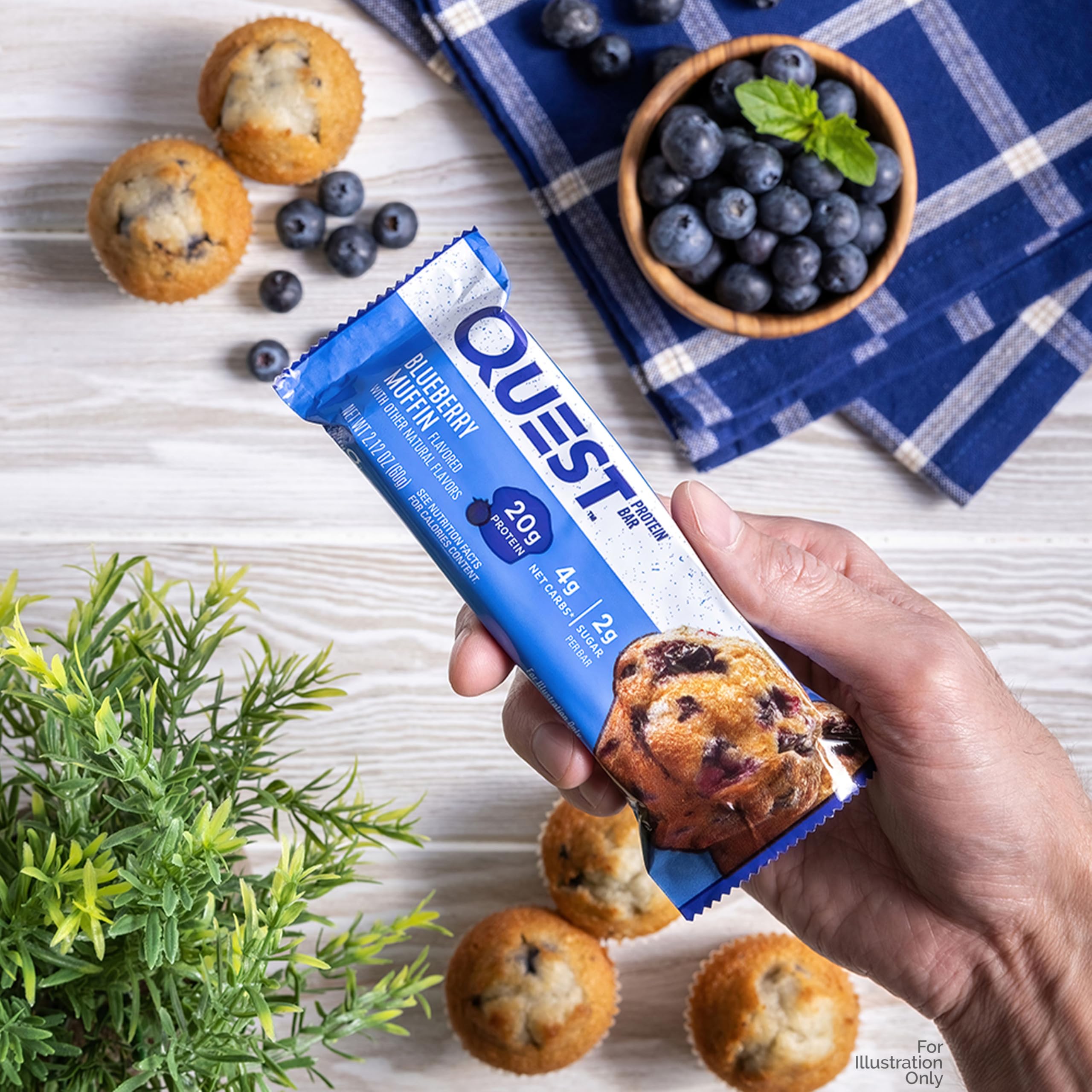 Hand holding Quest bar to show scale and portability for travel or gym use