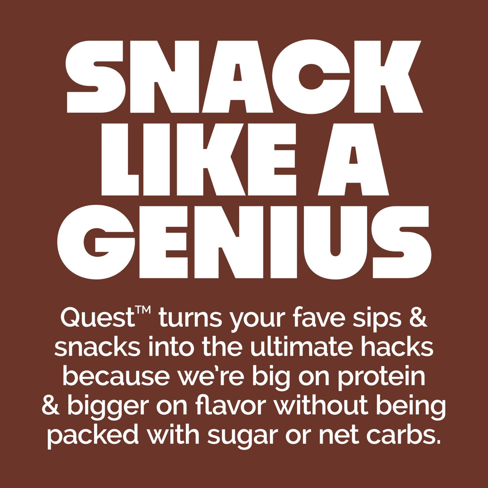 Quest bar in hand to show portion size and convenient on-the-go protein boost