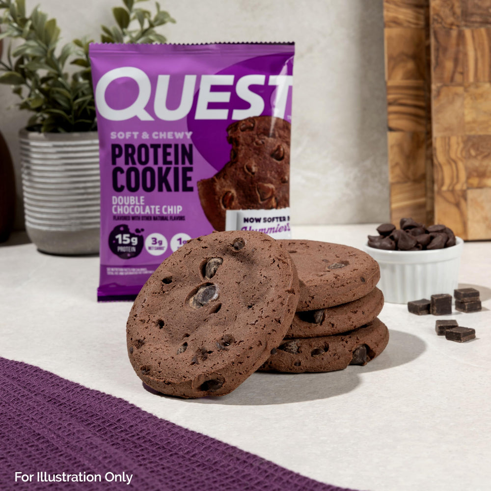 Quest cookie tucked in a gym bag next to a water bottle for quick post-workout protein