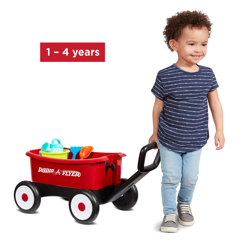 Radio Flyer pulled on sidewalk by child showing transition to pull-wagon play and hauling fun