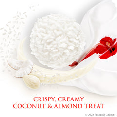 Raffaello single praline closeup revealing almond, creamy filling and coconut for texture