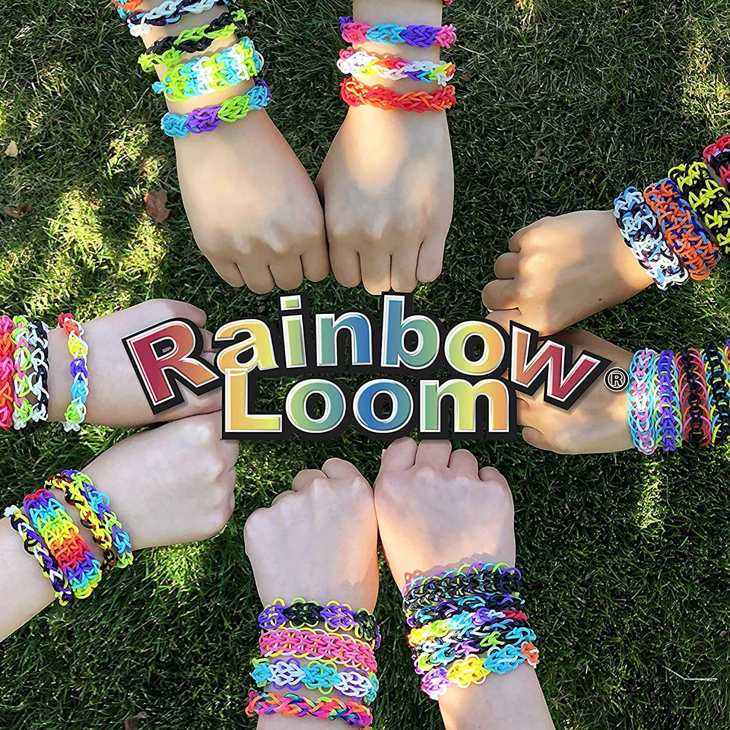 Rainbow Loom child crafting bracelet showing creativity and focus