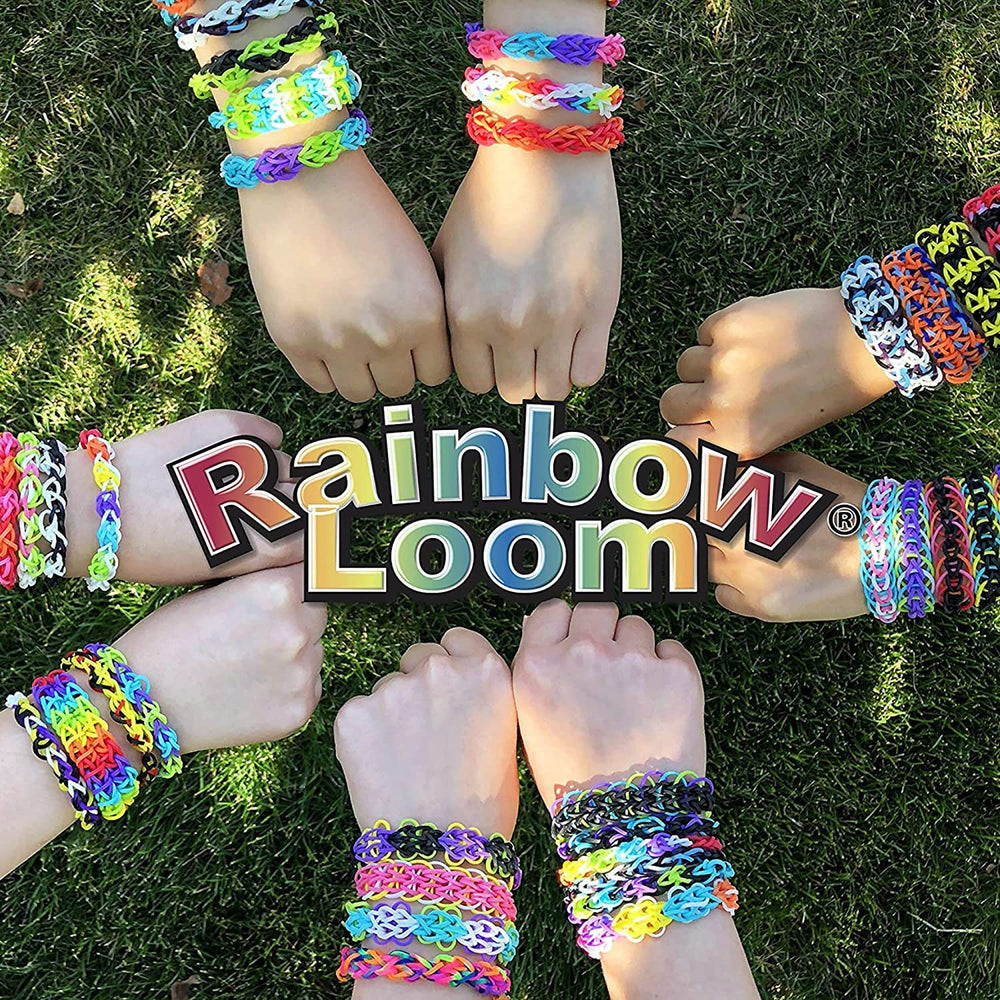 Rainbow Loom child crafting bracelet showing creativity and focus