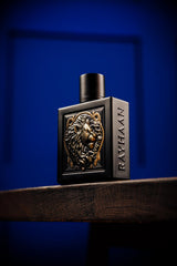 RAYHAAN perfume poured beside bottle showing size and texture