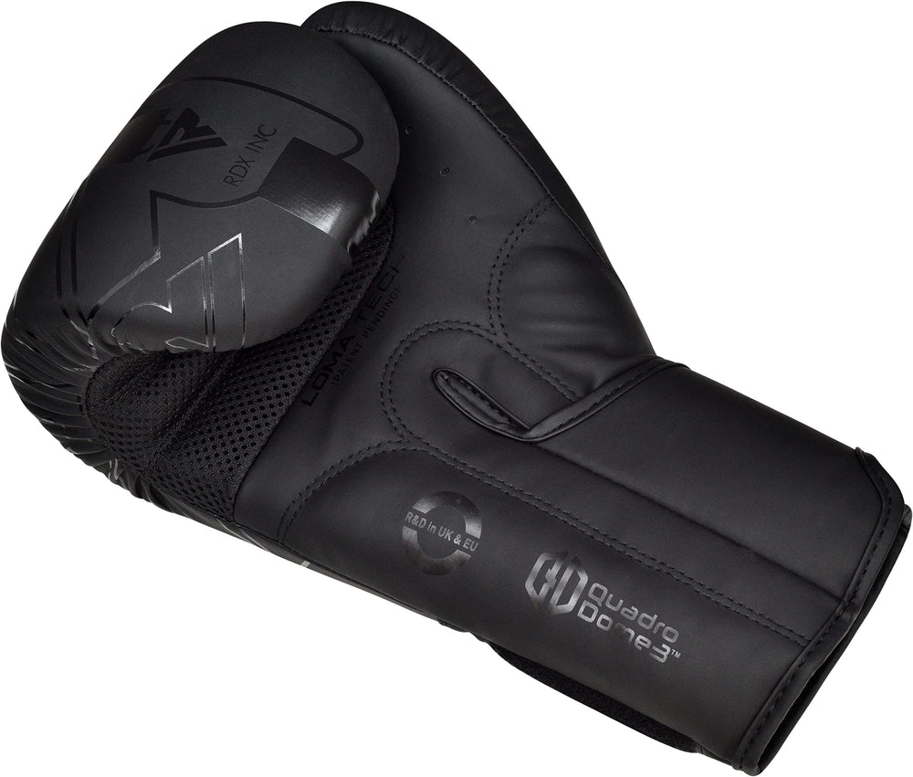 RDX gloves in use on a heavy bag demonstrating impact control