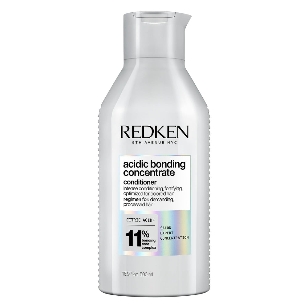 Redken bottle front packaging showing product and professional benefit