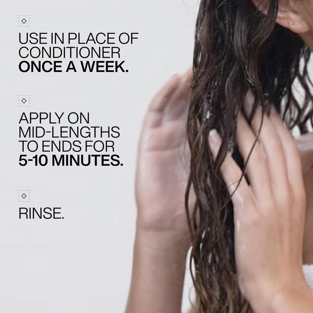 Redken jar on bathroom shelf staged for everyday routine and aesthetic appeal