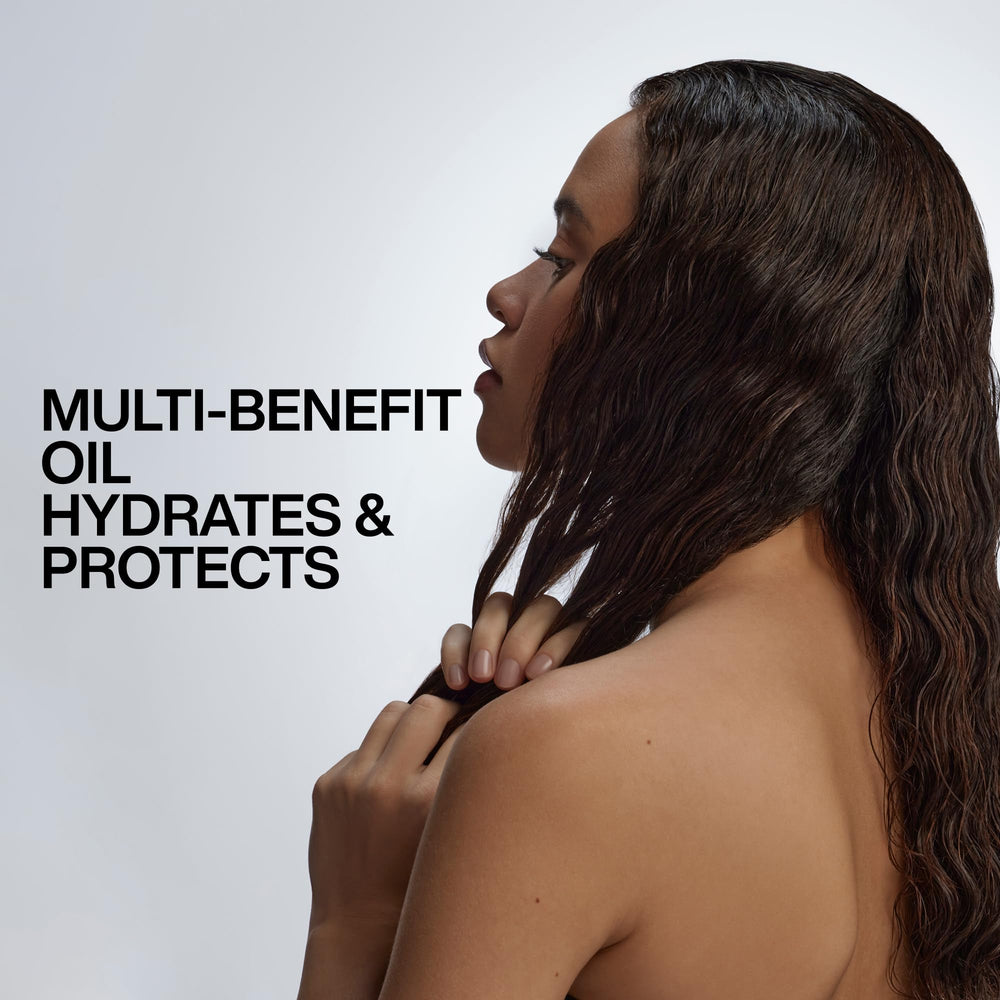Redken oil used during blow-dry scene improving smoothness and manageability