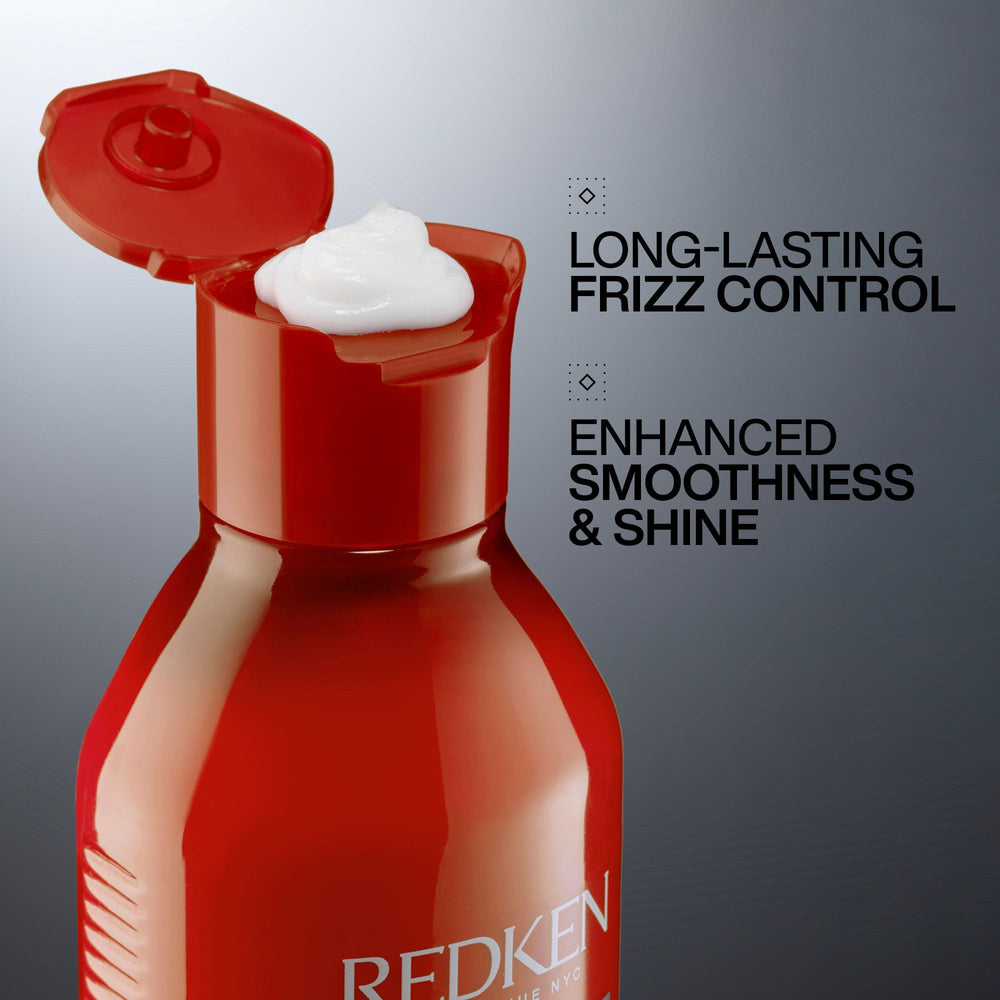 Redken Frizz Dismiss conditioner back label closeup listing ingredients and usage benefit