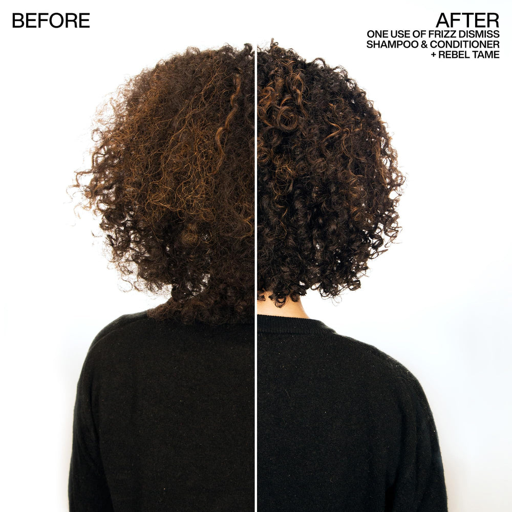Closeup of Redken Frizz Dismiss conditioner texture showing smooth cream that detangles