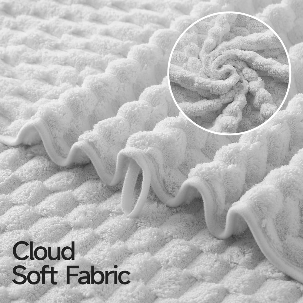 REDKISS towel styled on bathroom sink for modern aesthetic