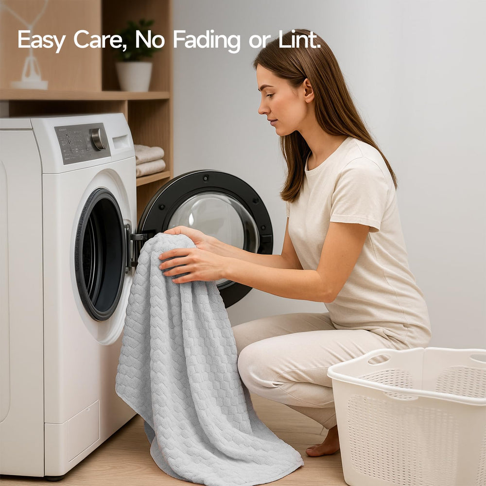 REDKISS towel absorbing water from wet surface showing quick pickup