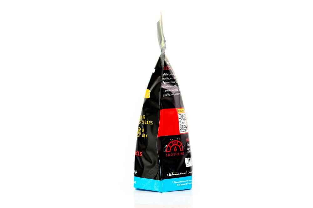REDMOND single Re-Lyte stick packet held between fingers for easy portability