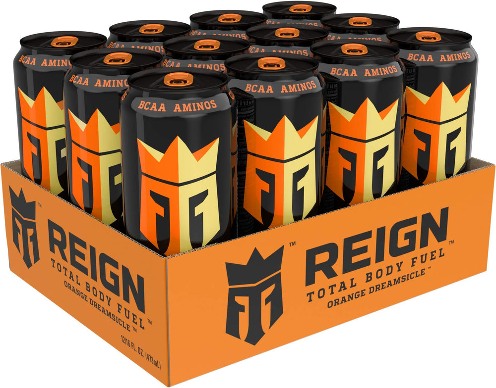 Hand holding Reign 16 fl oz can for size comparison and portable performance boost