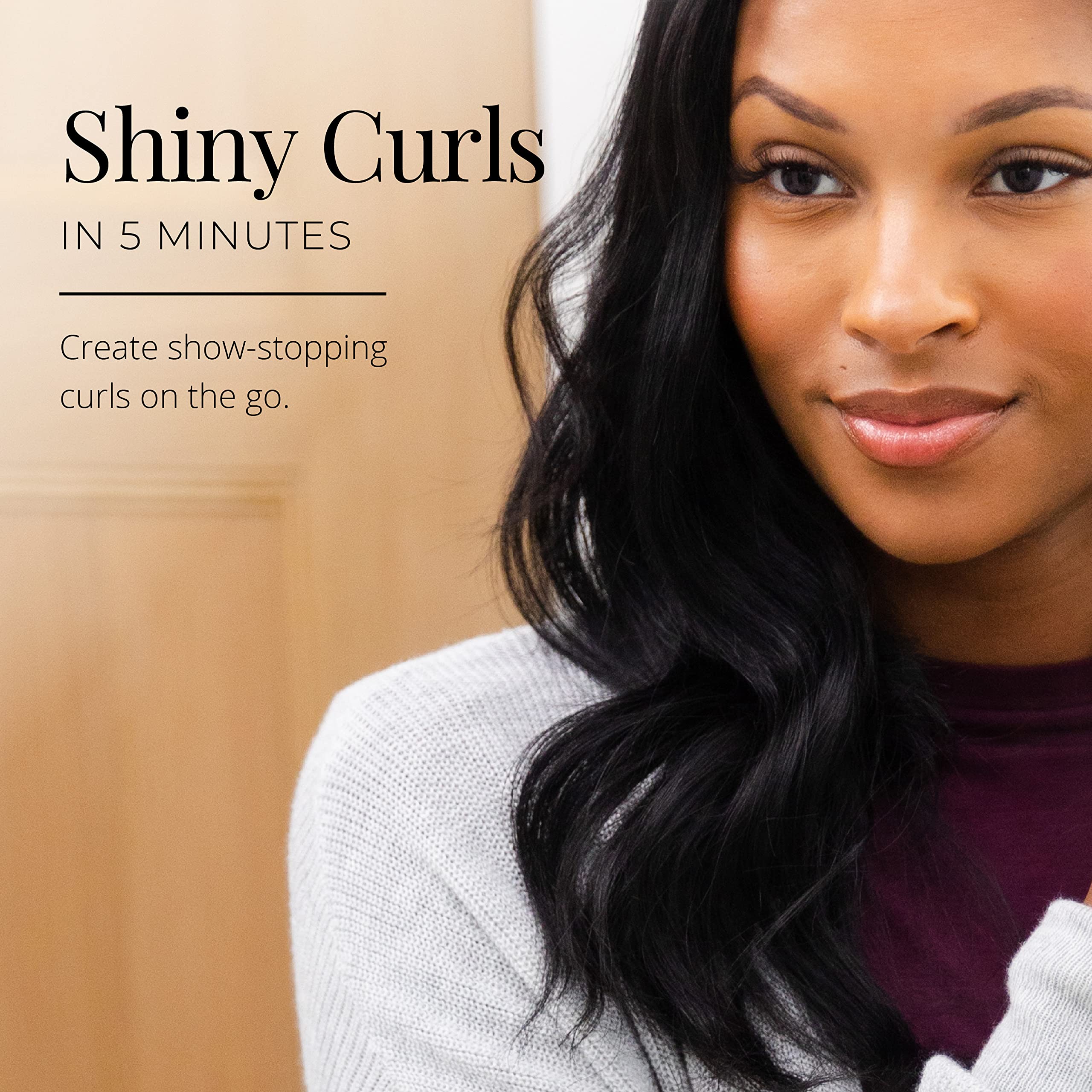 Remington rollers in use on model creating shiny curls for salon-like results
