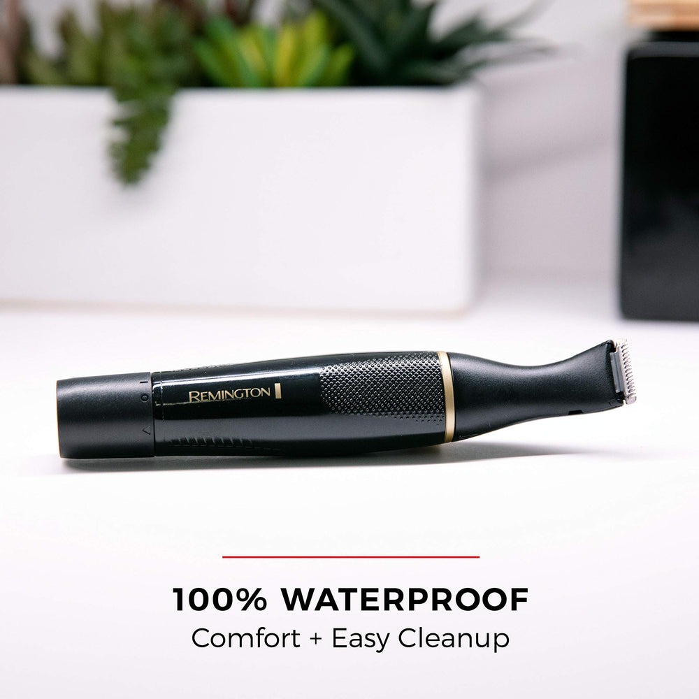 Remington trimmer being rinsed under tap to show washout cleaning convenience