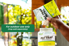 RESCUE! trap hung outdoors near typical fly source to improve trapping effectiveness