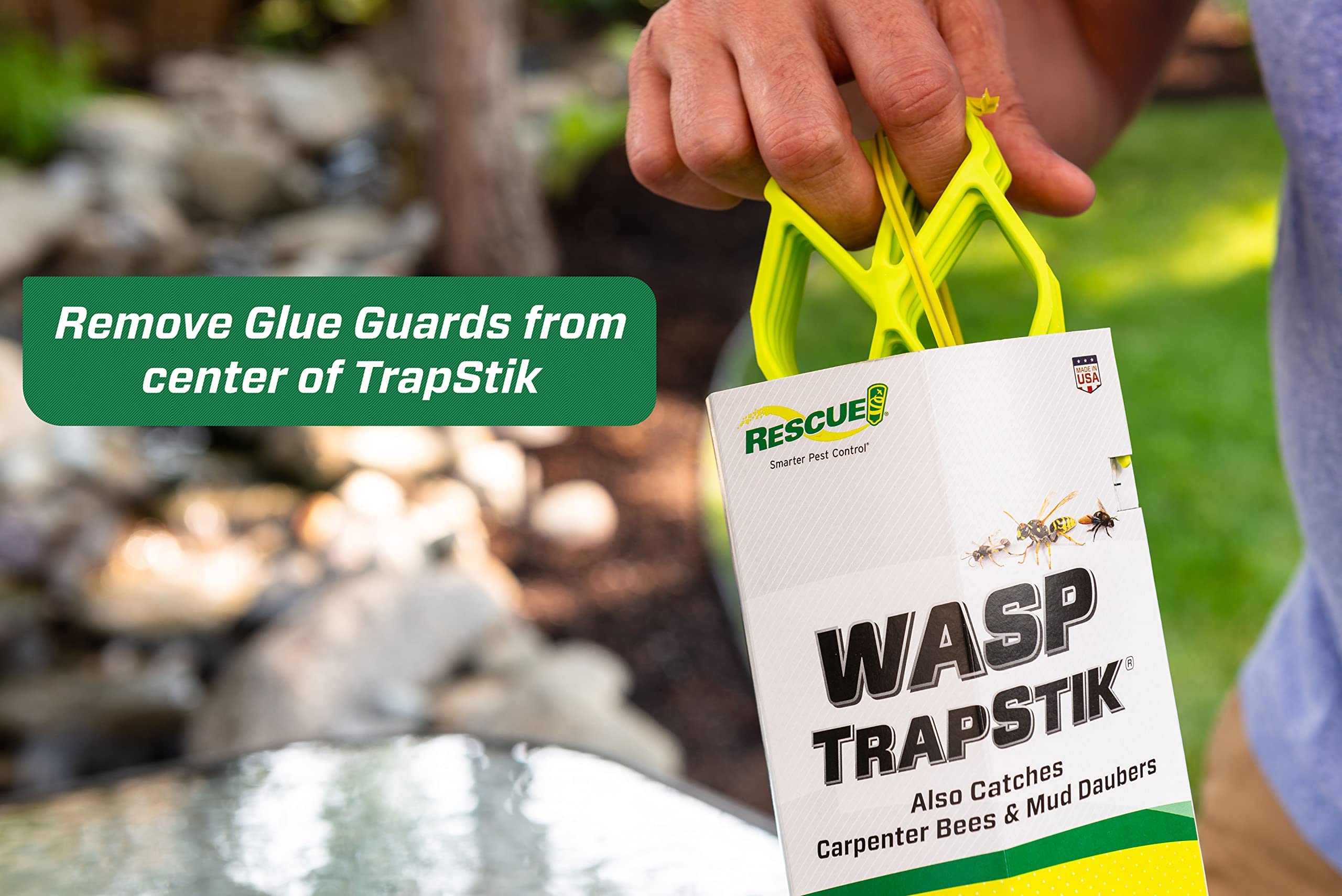 RESCUE! TrapStik next to hand showing compact size and easy placement