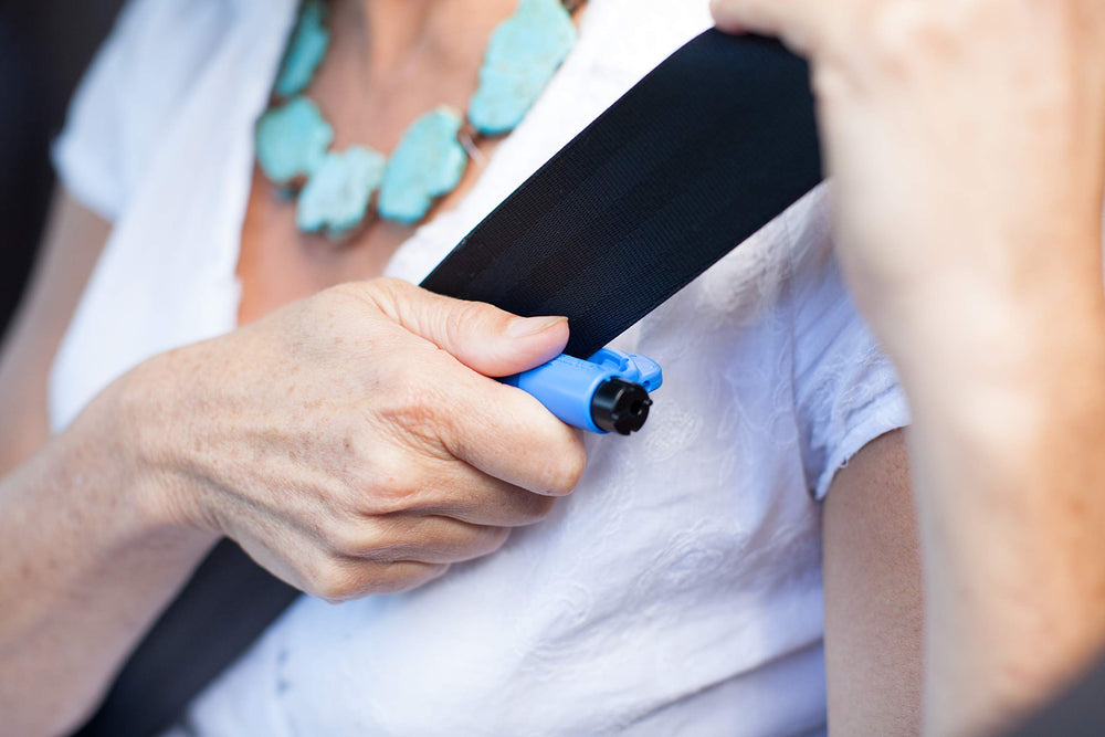 RESQME cutting a seatbelt to demonstrate fast, clean belt removal