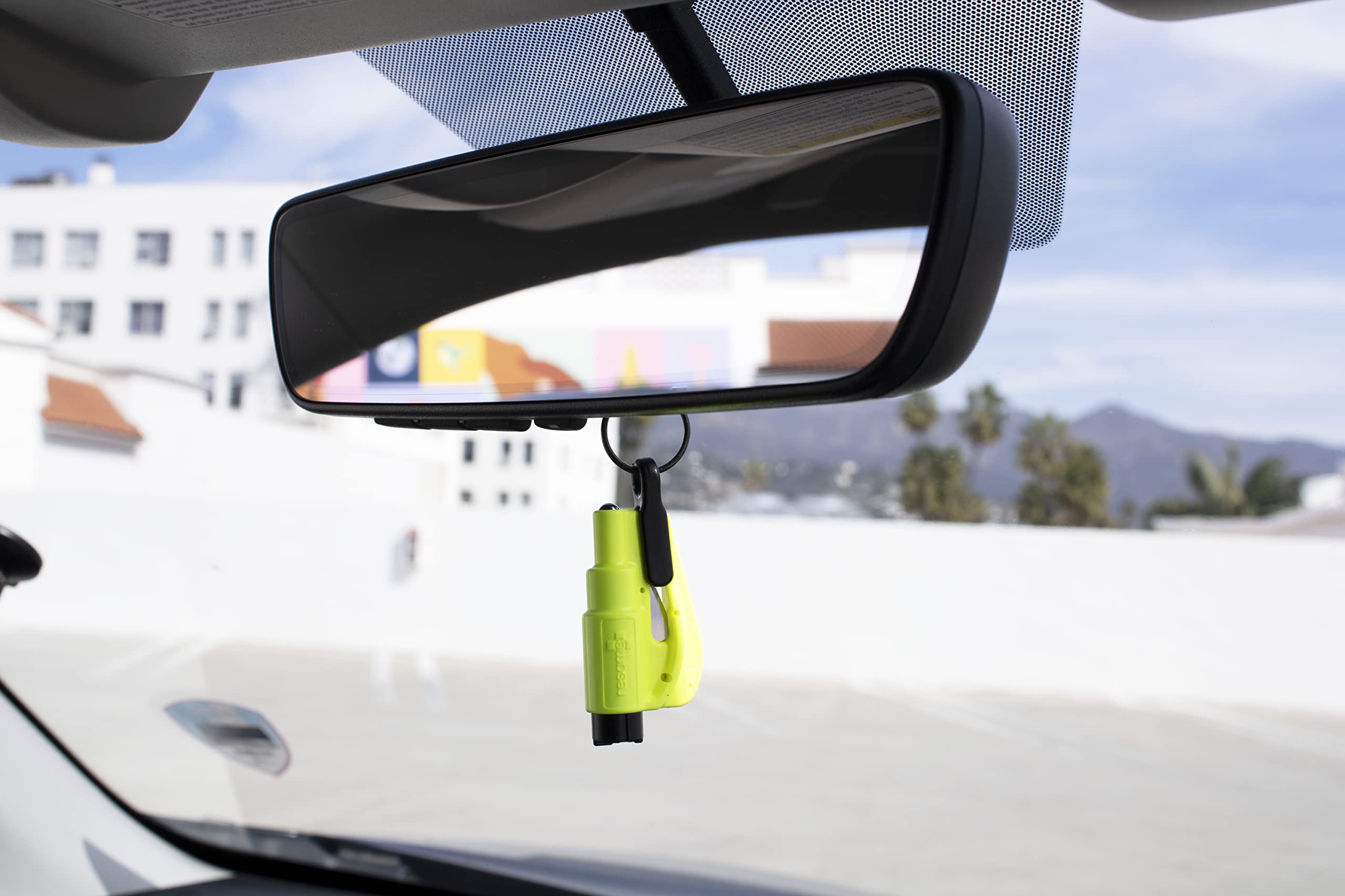 RESQME on vehicle dashboard showing everyday carry and visibility