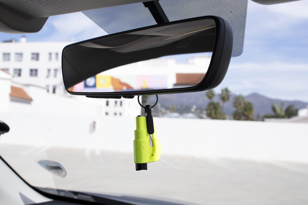 RESQME on vehicle dashboard showing everyday carry and visibility