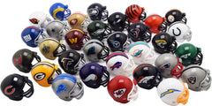 Riddell helmet held in hand for size comparison showing gumball-scale convenience and portability