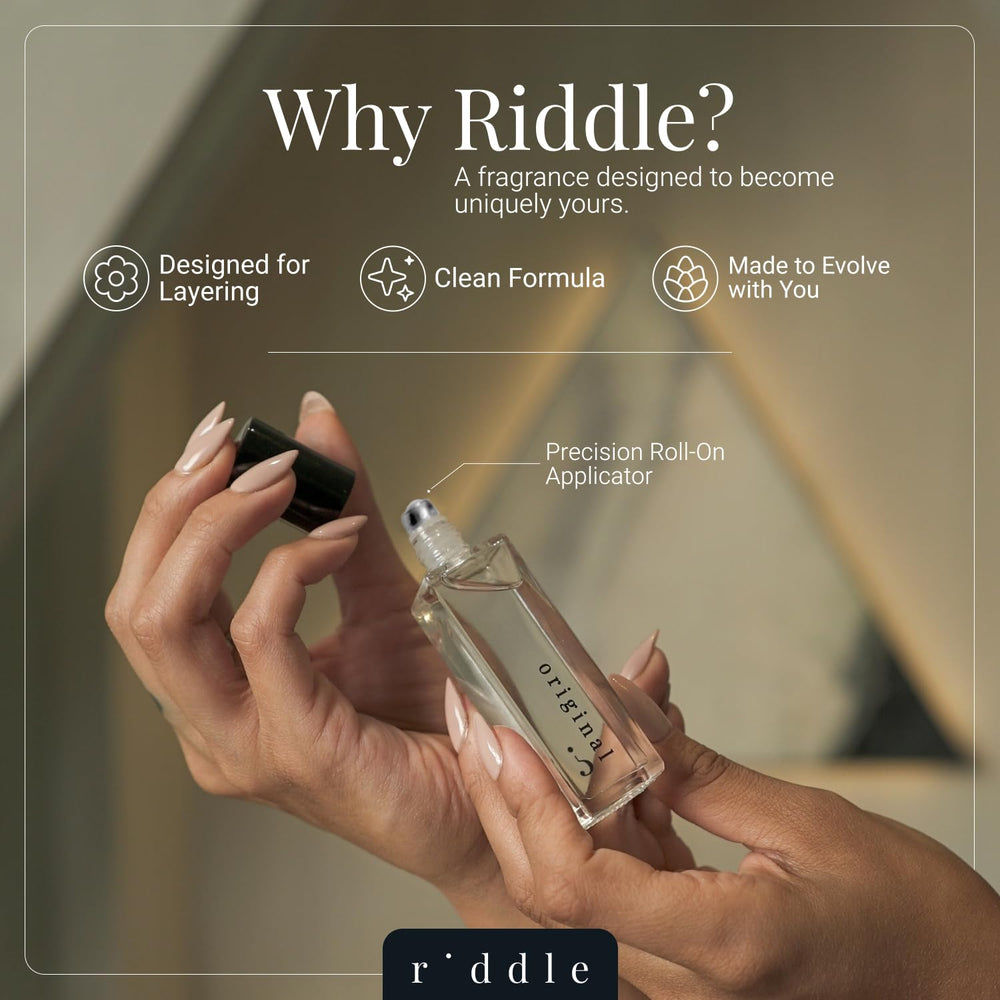 Riddle roll-on applied to a wrist demonstrating subtle, long-lasting scent