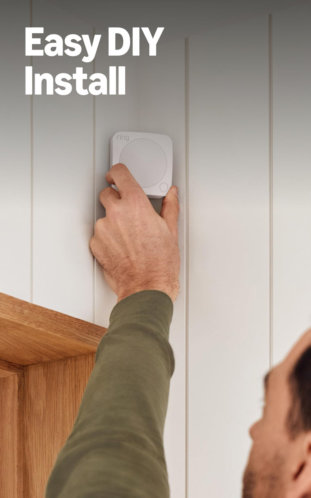 Ring motion detector mounted in living room demonstrating motion detection benefit